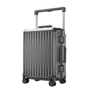 Dark grey hard-shell carry-on suitcase with vertical ridges, aluminum frame, dual TSA locks, spinner wheels, and a telescopic handle.