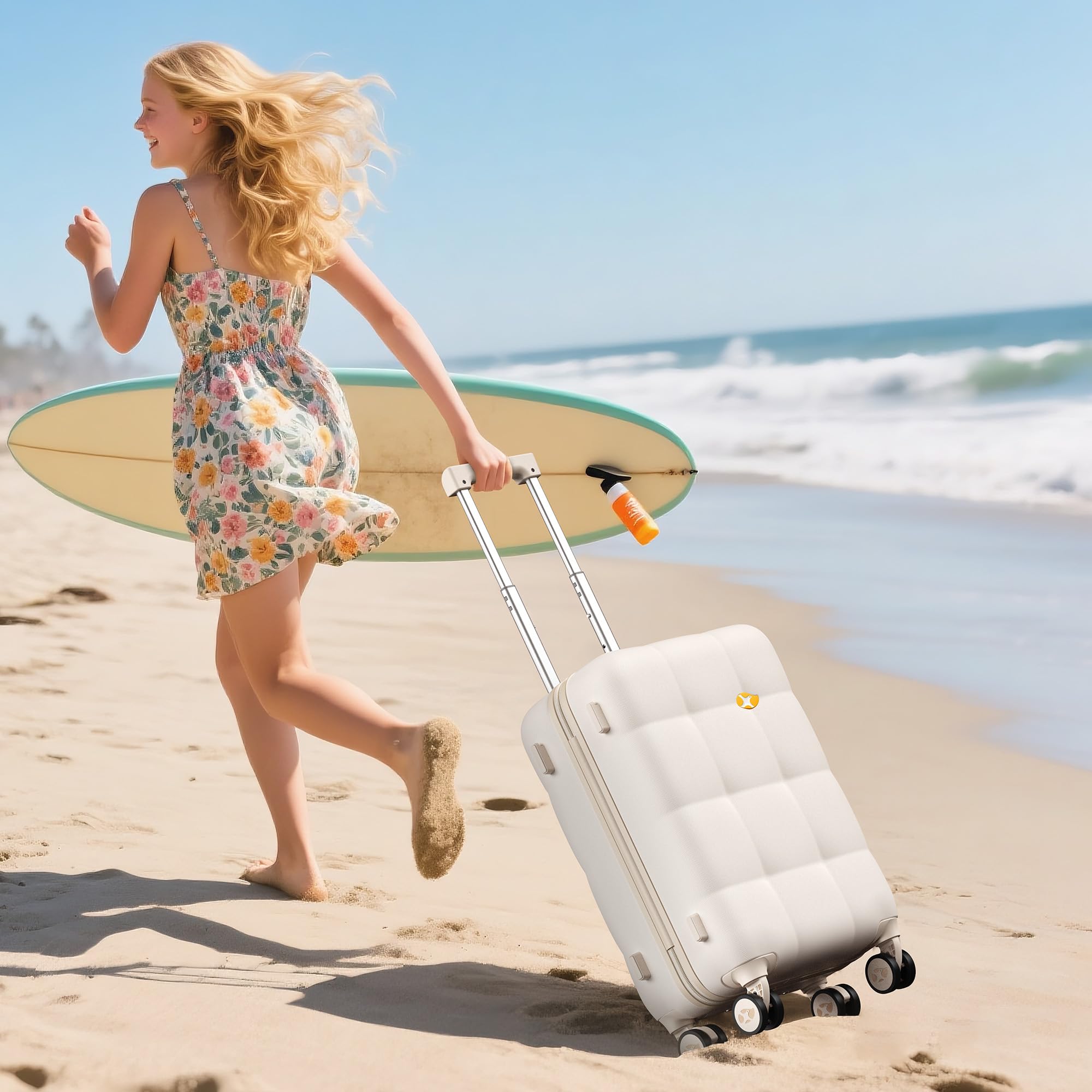 Woman with a floral dress and surfboard walking on a beach with a white suitcase.