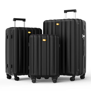 Three black suitcases of different sizes on a white background