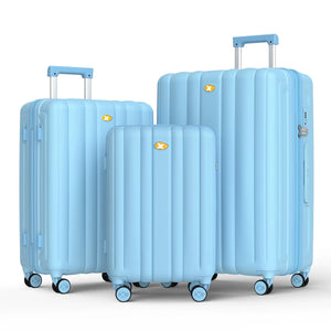 Set of light blue suitcases of different sizes on a white background