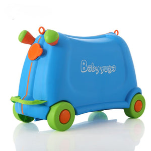 Blue BabyYuga ride-on suitcase with green wheels and orange accents, featuring a pull strap and kid-friendly design.