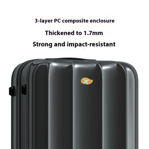 Black suitcase with a gold logo on a white background, featuring text about its 3-layer PC composite enclosure.