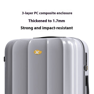 Silver suitcase with text about a 3-layer PC composite enclosure on a white background