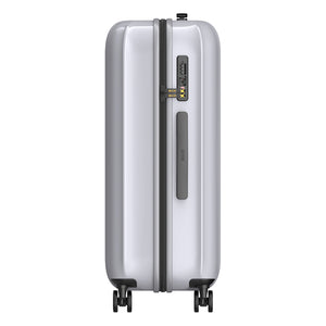 Silver suitcase with black wheels and handle on a white background