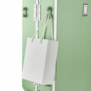 Side hook on Nordiva Classic Mint Green suitcase – attach shopping or handbags for hands-free airport or city travel.