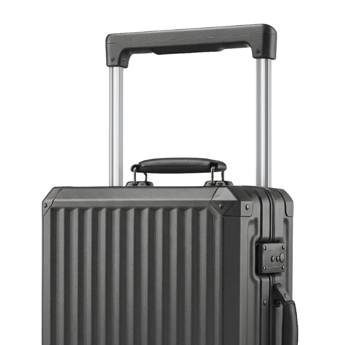 Close-up of a dark grey suitcase showing its telescopic handle, top carry handle, and vertical hard-shell ridge design.