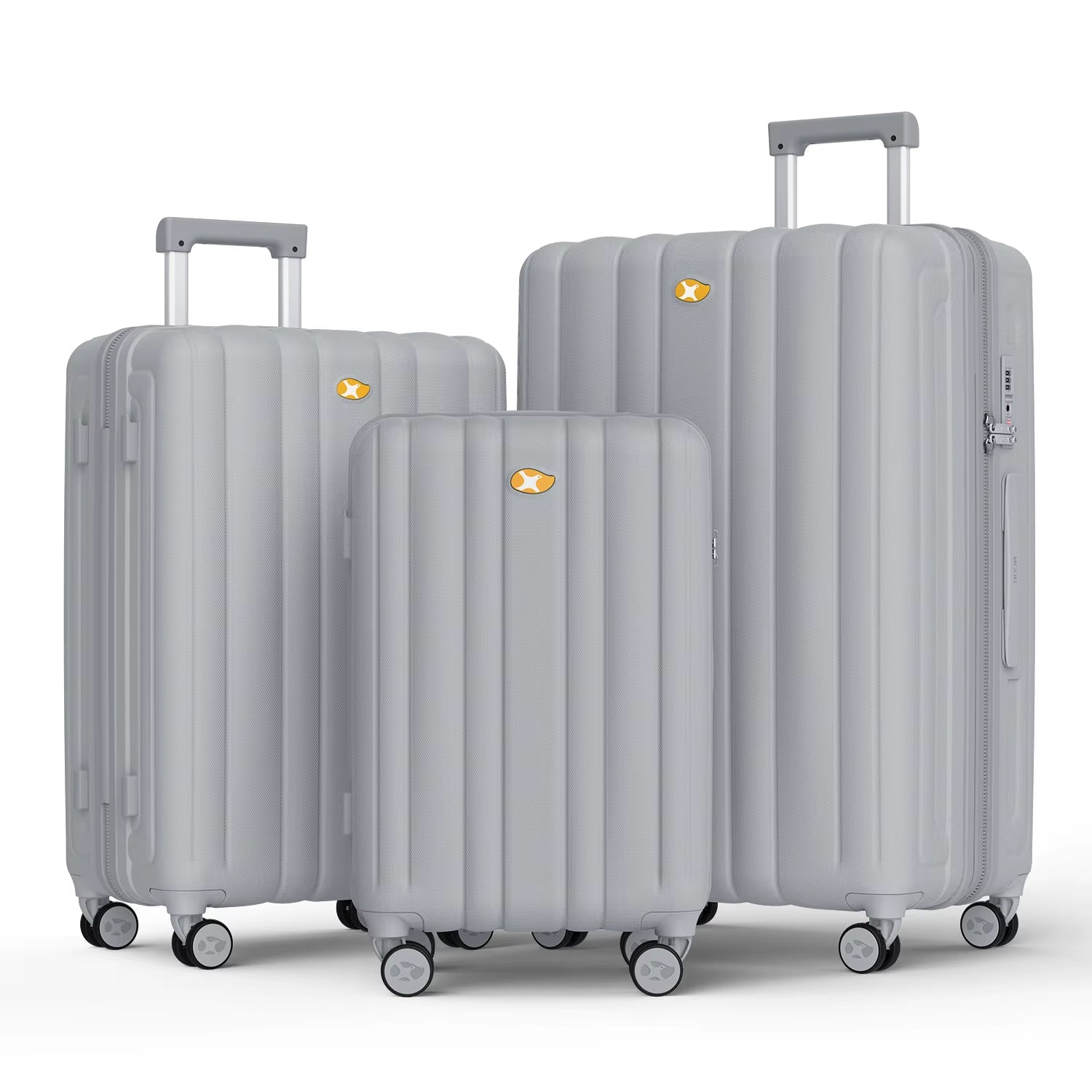 Set of gray suitcases with visible brand logo on a white background