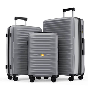 Set of three gray suitcases with a visible brand logo on a white background
