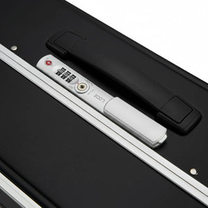 Close-up of a black suitcase with a digital lock on a white background