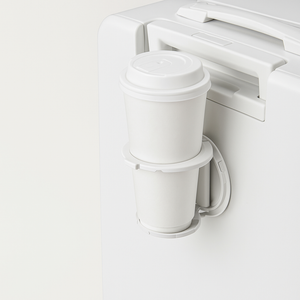 White coffee maker with two white cups on a white background