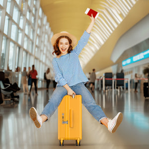 Woman in an airport with a yellow suitcase and a red passport, smiling and happy.