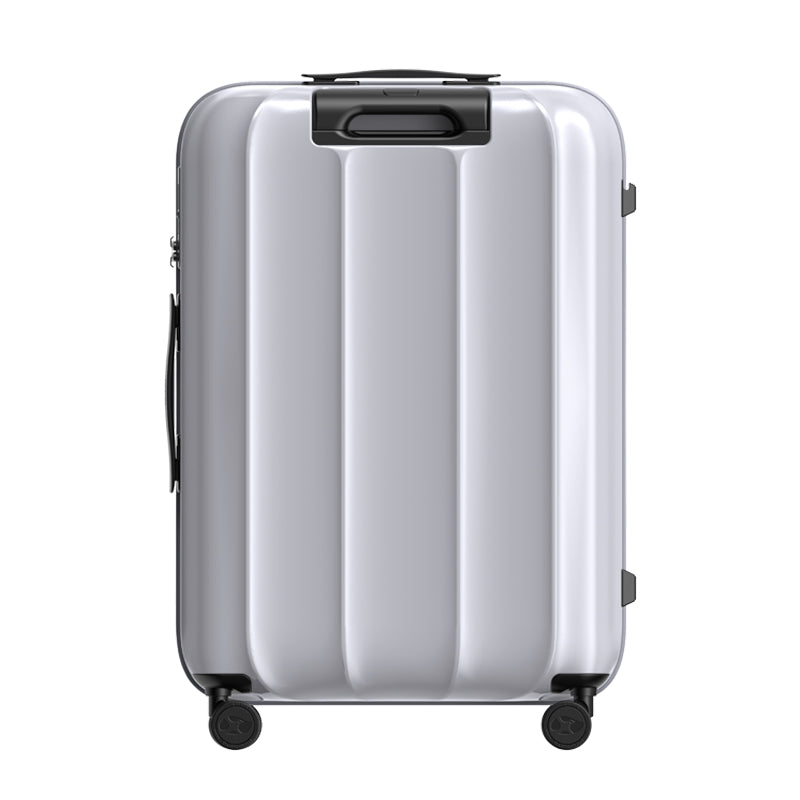 Silver suitcase with black wheels on a white background