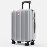 Silver suitcase with a handle and wheels on a white background