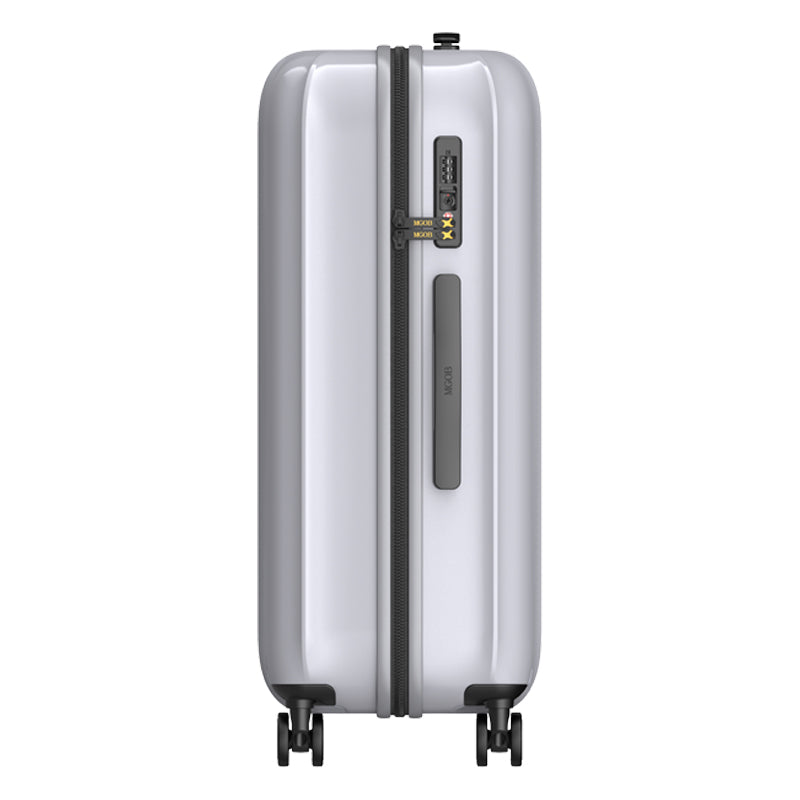 Silver suitcase with black wheels and handle on a white background