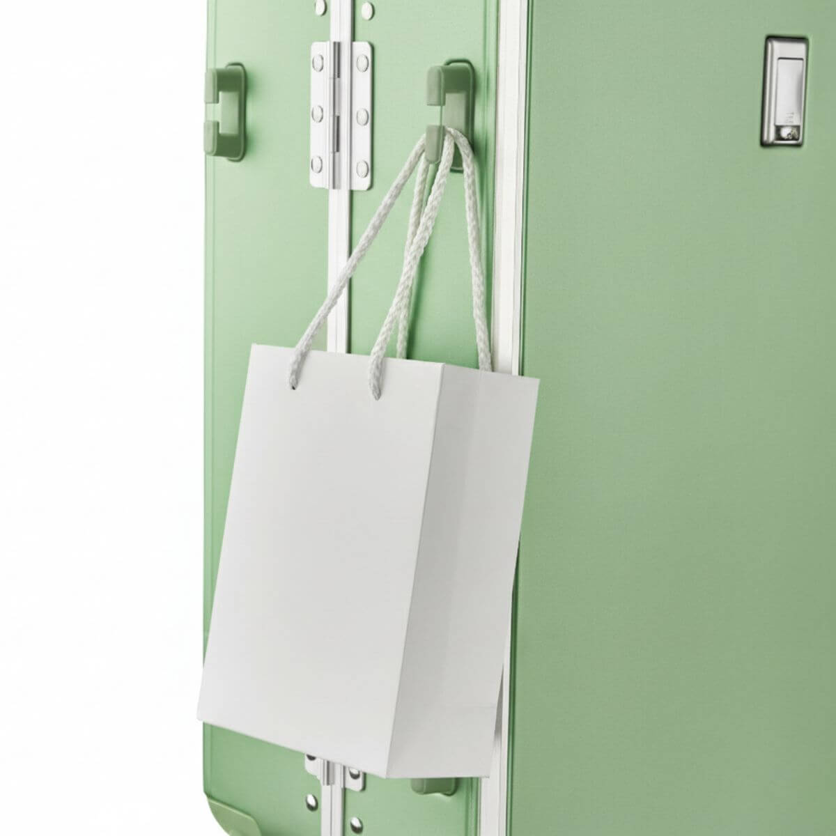 Side hook on Nordiva Classic Mint Green suitcase – attach shopping or handbags for hands-free airport or city travel.